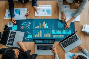 A collaborative business meeting that prominently features advanced data analysis techniques and cuttingedge technology is designed to drive organizational success and foster innovation