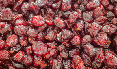 Close up photo of dried cranberries, selective focus.