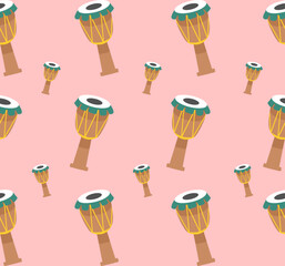 Seamless pattern with traditional drums on a soft pink background