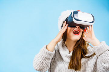 Girl watching 3d film tour in virtual reality glasses.