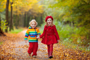 Kids playing in autumn park