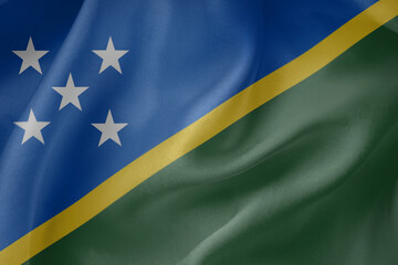 Solomon Islands waving flag close up fabric texture background