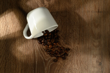 A Small coffee cup with coffee beans