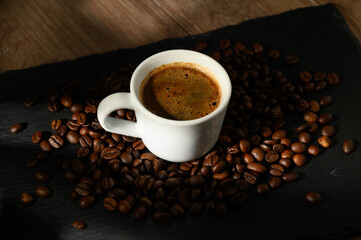 Cup filled with coffee beans