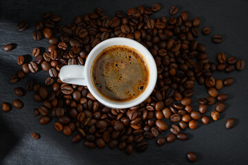 Arabic coffee cup with roasted beans