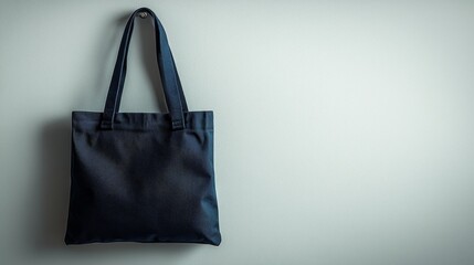 Black Tatami Tote Bag Hanging on a Wall Minimalist Composition Simple and Elegant Tote bag