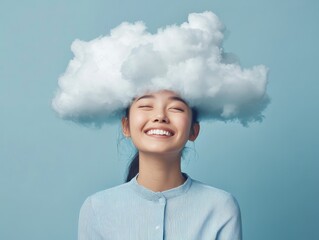 Joyful woman with a cloud on her head, representing creativity and imagination. Blue background. Perfect for artistic and whimsical concepts.