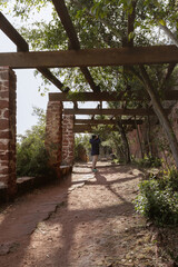 Trail path perspective with wooden arches, Tarragona.