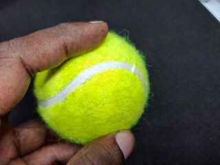 A tennis ball is a pressurized, rubber sphere covered in bright, felt fabric. It’s designed for...