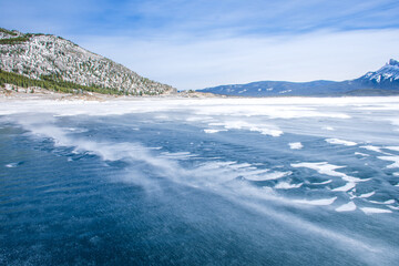 Fototapeta premium Winter landscape with mountains and frozen Lake.