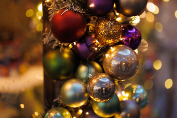 Background for design. New Year's decorations, toys and garlands in fabulous settings.
