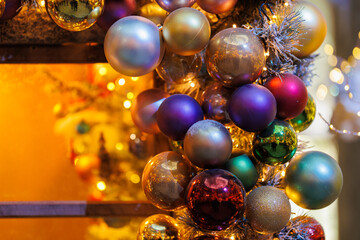 Background for design. New Year's decorations, toys and garlands in fabulous settings.