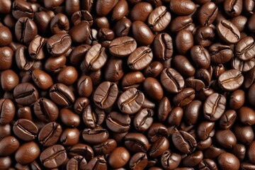 Obraz premium a close up of a pile of coffee beans with a brown background 