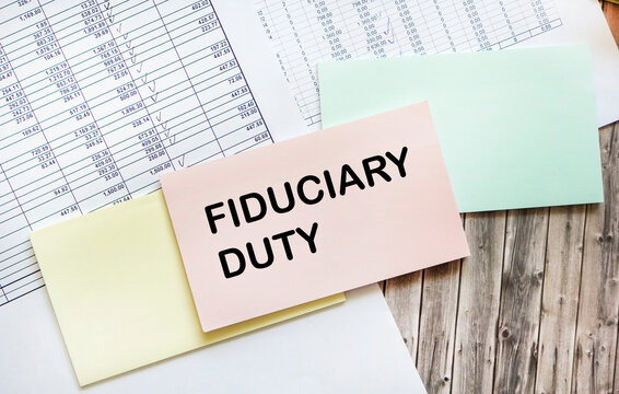 fiduciary duty text on sticker. Finance and economics concept. Finance concept.
