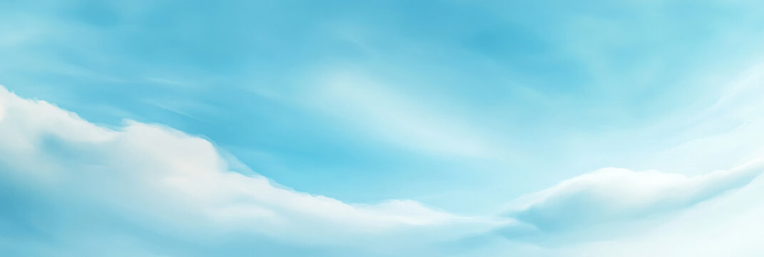 Soft, white clouds drift across a bright blue sky