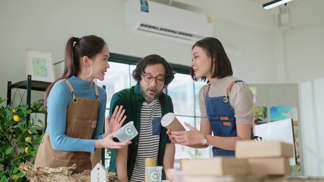 small business creative friend brainstorm discuss test material packaging in concpet net zero waste in business product produce process store show sample of reuse brown paper pack gift Sustainable use