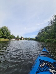Fototapeta premium View on the Müggelspree River on a sunny day from a Kayak in Berlin Rahnsdorf