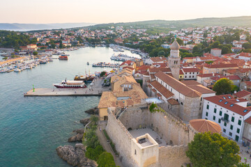 Aerial View of Coastal City Krk with Harbor and Red-Tiled Roofs