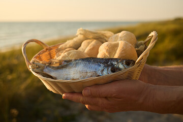Christianity, religion, Bible concept. Five loaves of bread and two fish