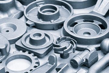 A collection of metal parts with a variety of shapes and sizes. Concept of complexity and diversity in the design of these parts
