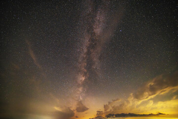 Beautiful bright milky way galaxy at the starry night sky. Astronomical background.