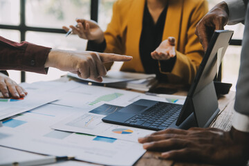 Group of Young Asian business team creative businesspeople coworker in office Happy to be successful partnership teamwork celebrating achievement and success concept.