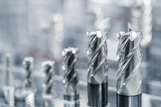 industrial drilling milling metal cutting tool with carbide cutter insert in workshop. Drills with interchangeable tungsten carbide heads. Milling metal cutter tools CNC machine, industrial background