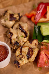 Deliciously Grilled Chicken Platter served alongside Fresh Colorful Vegetables and Sauce
