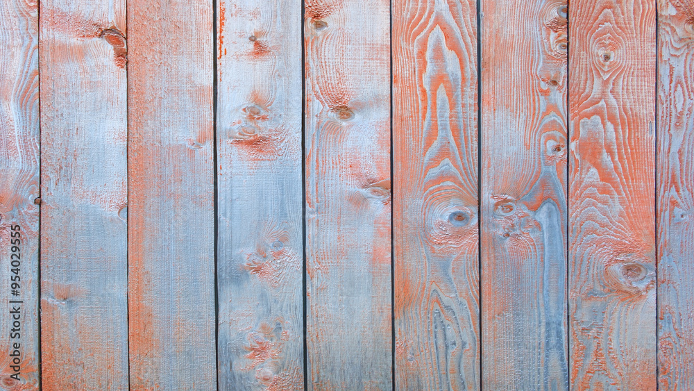 Poster a wooden board with a blue and orange color scheme. the board is made of wood and has a rustic appea