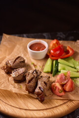 Indulge in a Delicious Grilled Steak Artfully Presented on a Wooden Serving Board