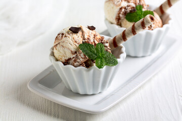 Chocolate vanilla ice cream with chocolate chips.