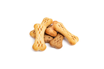 Bone shaped doggy treats pile isolated on white background