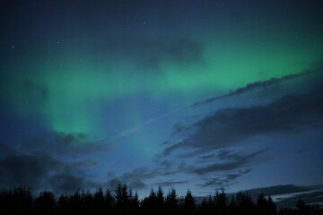 Fototapeta premium aurora borealis over the mountains