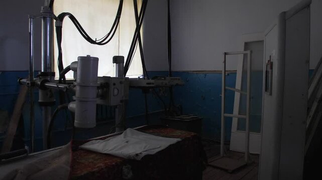 old x-ray machine of an abandoned hospital