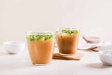 Spring iced scallion latte in glasses on the table