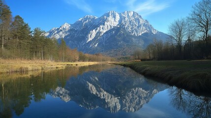 Still river reflects mountain's majesty