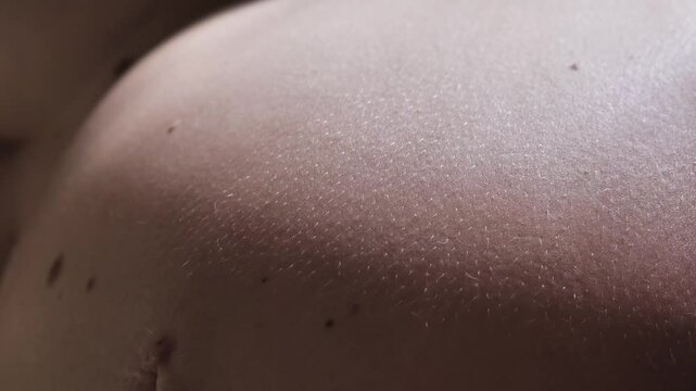 The baby moves in the belly of the mother-to-be. Close-up of the baby moving and kicking inside the womb. Active movement of the baby inside the mother's womb