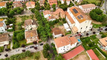 Fototapeta premium Aerial view of the historic center of Casciana Terme, Pisa, olive trees and vineyards in the background