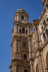 Architectural fragments of Malaga Cathedral facade. Renaissance Cathedral - Roman Catholic Church in the city of Malaga, was constructed between 1528 and 1782. Malaga, Costa del Sol, Andalusia, Spain.