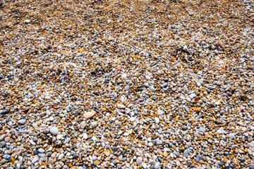 Sea pebbles beach background. Rock and stones abstract