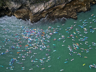 Brixham, Torbay, South Devon, England: DRONE VIEWS: Participants gather at Fishcombe Cove as they attempt to beat the World Record for the highest gathering of paddleboarders at sea (PHOTO 3).