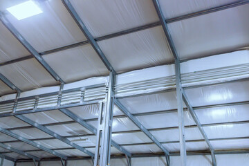 Steel construction is under way for new barn metal frame