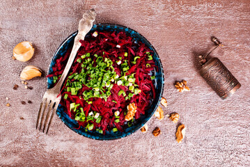 Ripe beet salad with balsamic vinegar dressing and thyme.