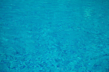 blue water in swimming pool background 2