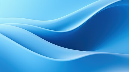 Obraz premium A smooth gradient of blue waves creating a serene and calming abstract background.