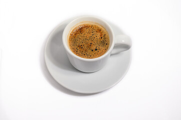 Cup of coffee on white background, top view, hot drink