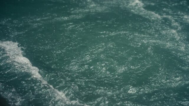Slow Motion close up of water rushing in a tropical rainforest jungle