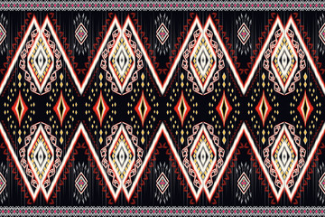 ikat Abstract Ethnic art. Seamless pattern in tribal, folk embroidery, and Mexican style. Aztec geometric art ornament print.Design for carpet, cover.wallpaper, wrapping, fabric, clothing