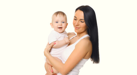 Happy cheerful smiling mother holding baby, joyful young mom and little child on white background