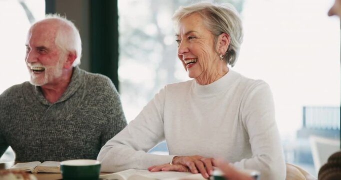 Happy, senior people and book club in nursing home for lesson, knowledge and education. Laugh, elderly group and bible study in common room for learning, history information and scripture reading